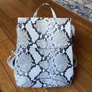 Brand New white faux leather Snakeskin Backpack. So cute.